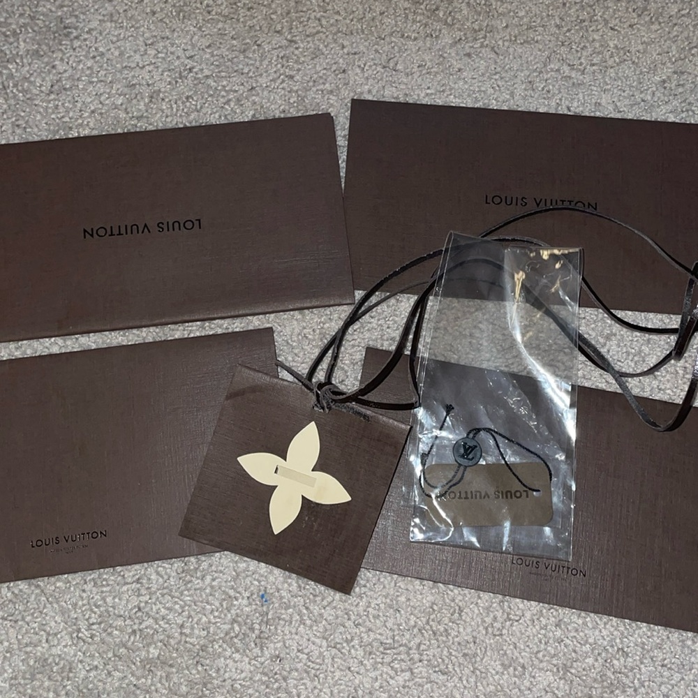 Louis Vuitton receipt holder